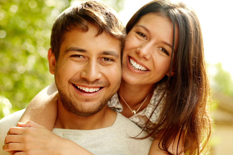 Dental Patients Smiling With Well Cared For Dental Implants In Mission Viejo, CA