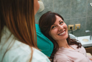 Dental Patient Smiling After Getting Her Full Mouth Dental Implants